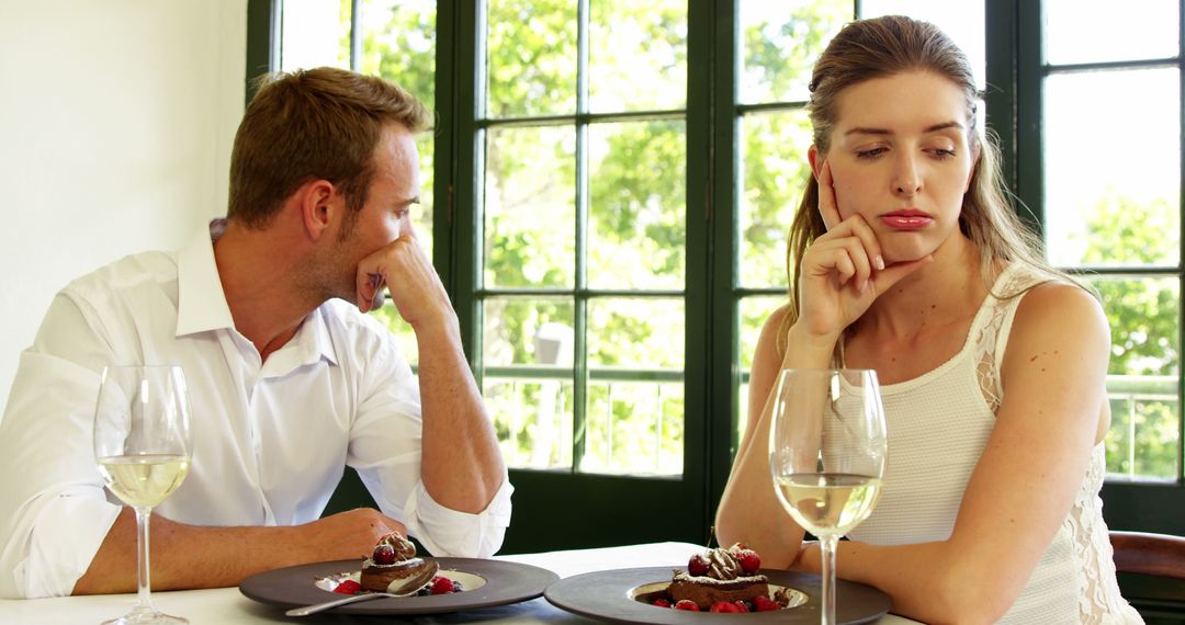 Couple Experiencing Relationship Problems at Dining Table - Free Images, Stock Photos and Pictures on Pikwizard.com