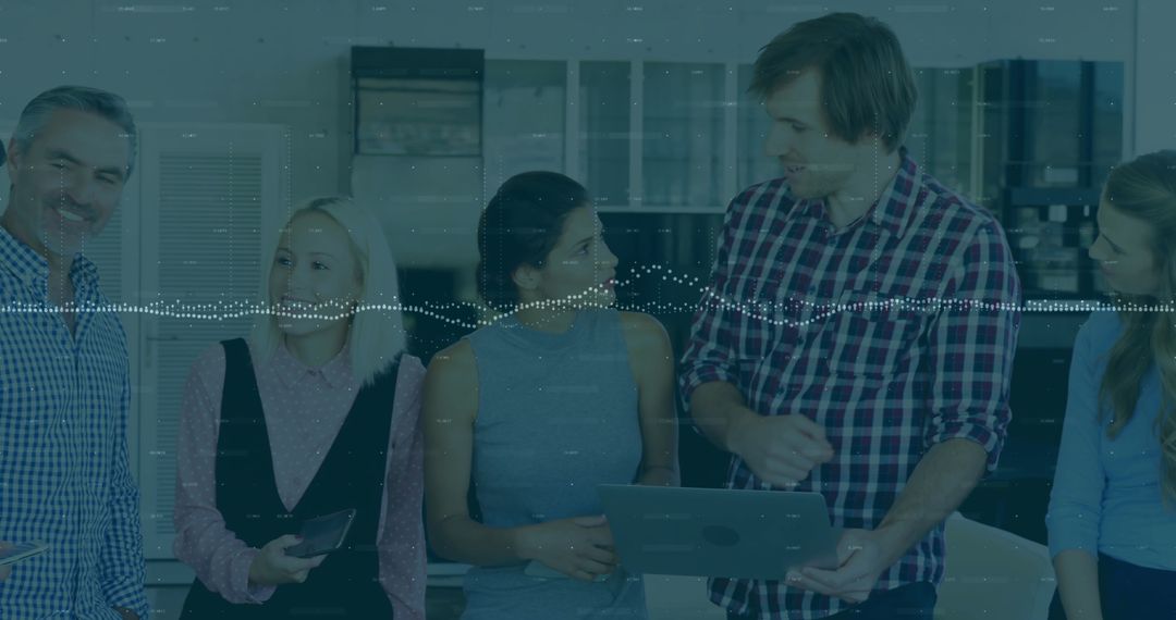 Diverse Business Team Collaborating Over Financial Data Projection