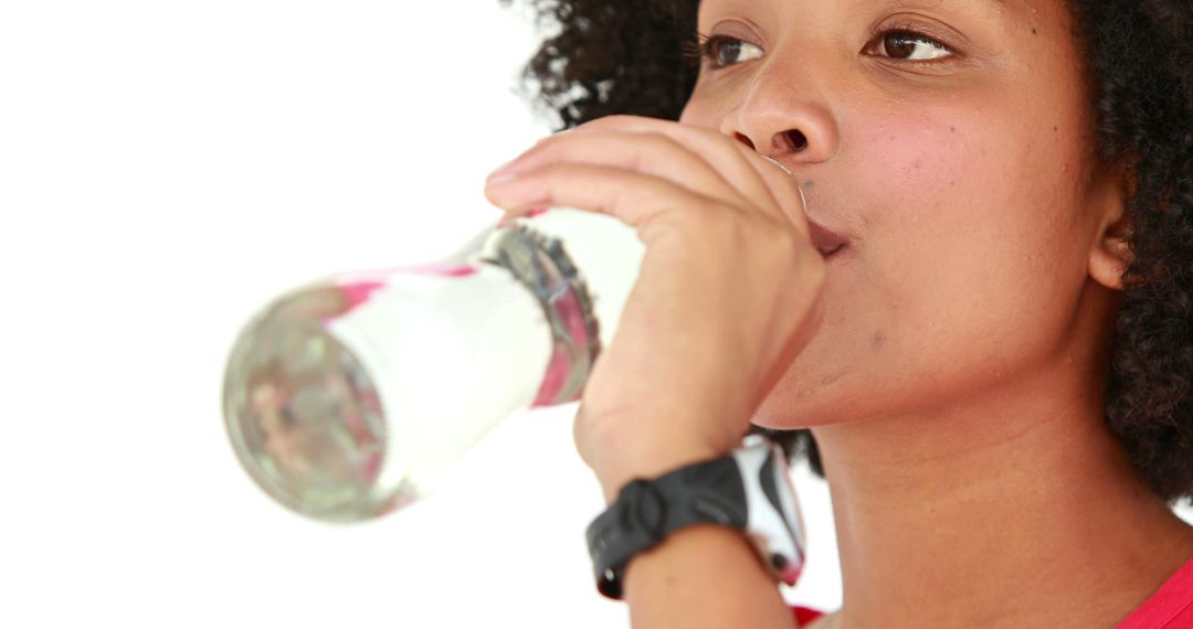 Young Woman Drinking Water for Hydration - Free Images, Stock Photos and Pictures on Pikwizard.com