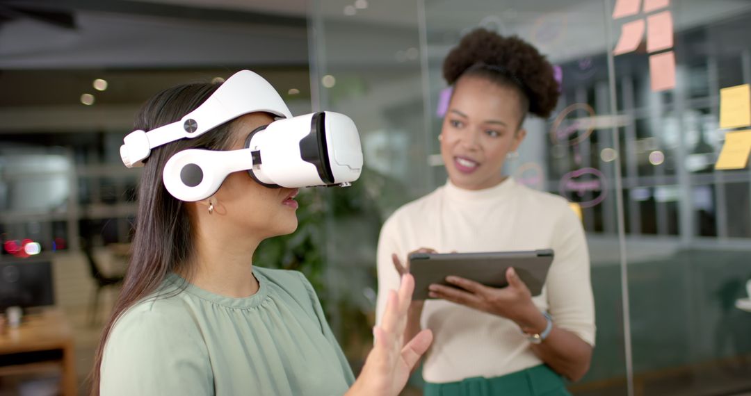 Colleagues Collaborating with VR Technology in Modern Office Environment