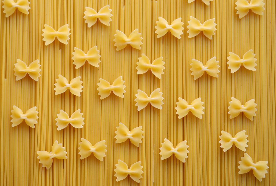 Assorted Uncooked Italian Pasta Background Top View - Free Images, Stock Photos and Pictures on Pikwizard.com