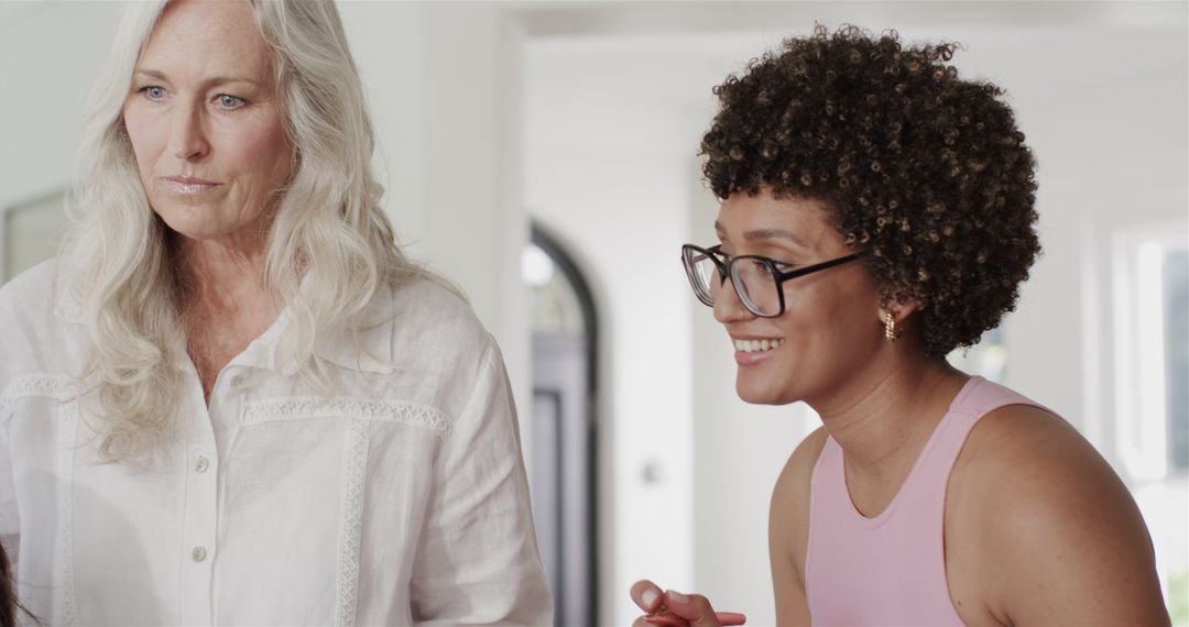 Bride Preparing for Wedding with Stylist and Smartphone