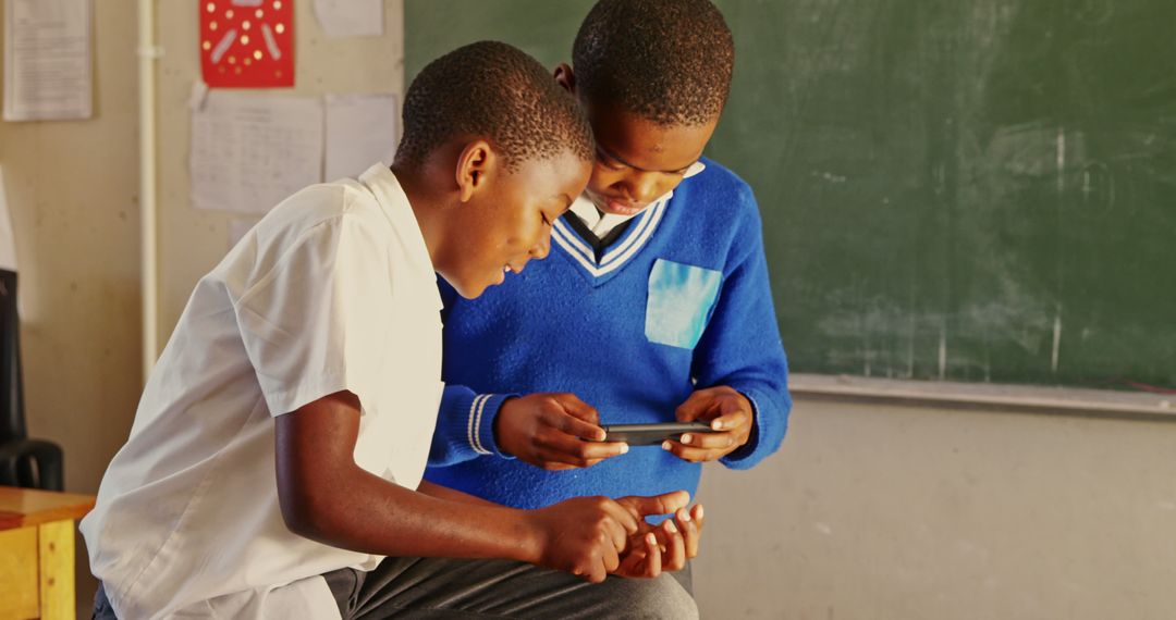 African Schoolboys Using Tablet in Classroom - Free Images, Stock Photos and Pictures on Pikwizard.com