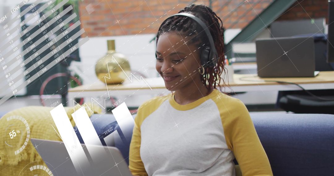 Tech-Savvy Businesswoman Analyzing Financial Data on Laptop