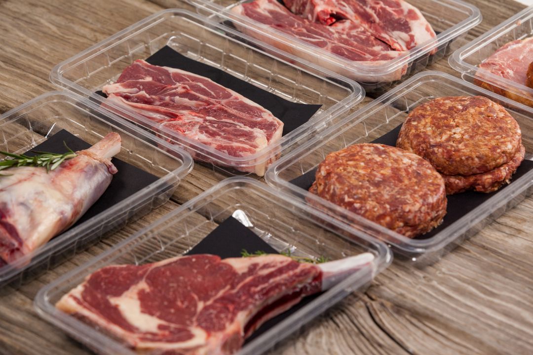 Varieties of meat in plastic boxes - Free Images, Stock Photos and Pictures on Pikwizard.com