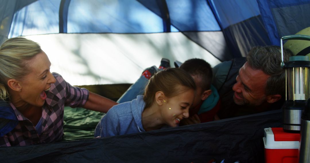 Family Enjoying Camping Inside Tent Together - Free Images, Stock Photos and Pictures on Pikwizard.com