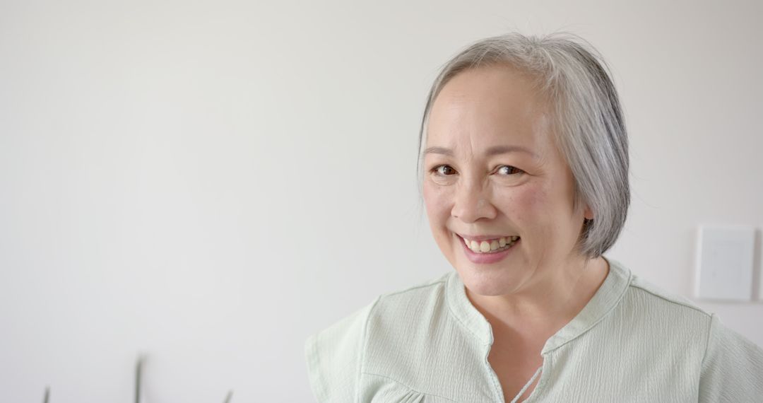 Cheerful Senior Woman Smiling Indoors