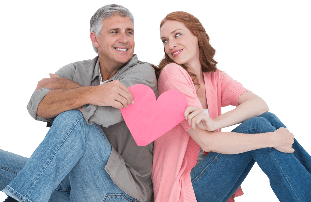 Smiling Middle-aged Couple Holding Transparent Pink Heart