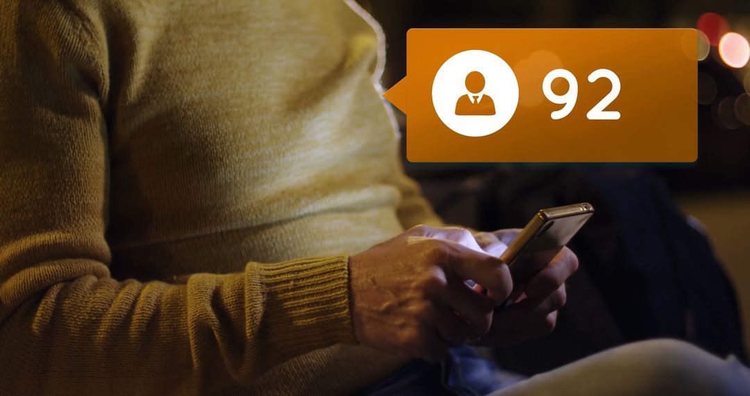 Man Seated on Night Bench Typing with Mobile Follower Alert