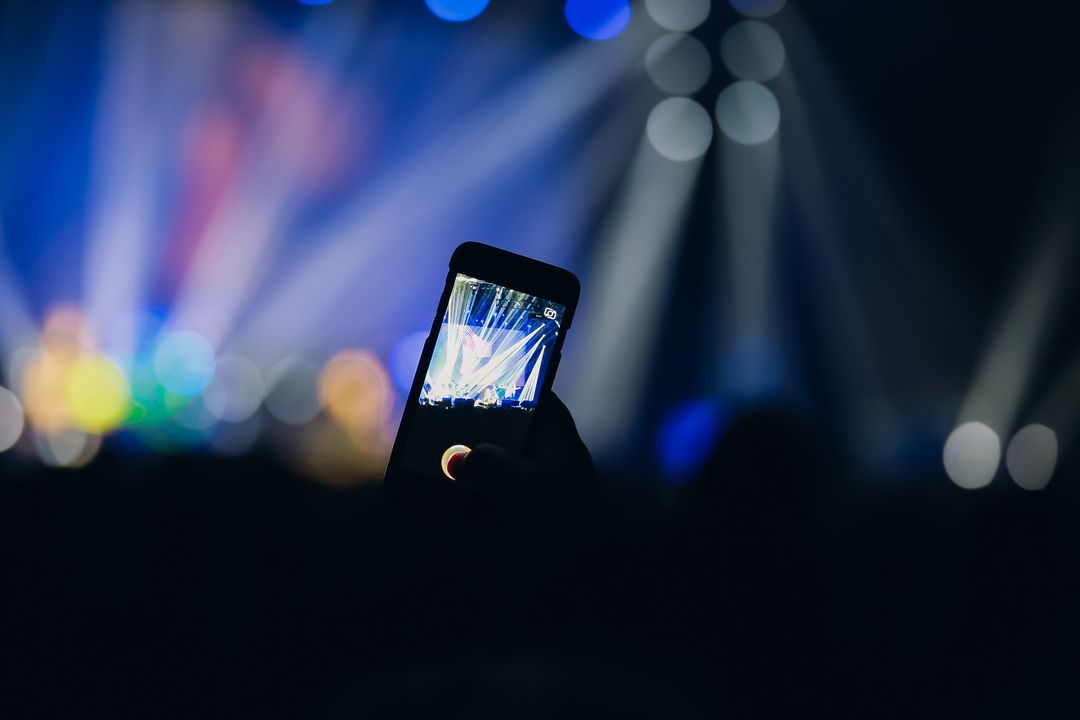 Capturing Concert Moments with Smartphone - Free Images, Stock Photos and Pictures on Pikwizard.com