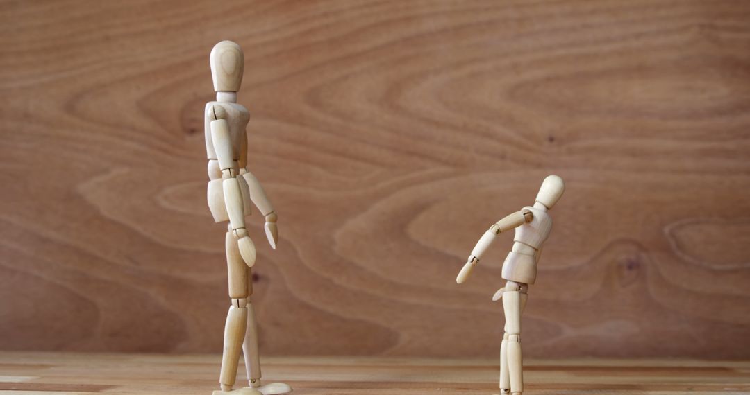 Wooden Art Mannequins Standing on Wooden Surface - Free Images, Stock Photos and Pictures on Pikwizard.com