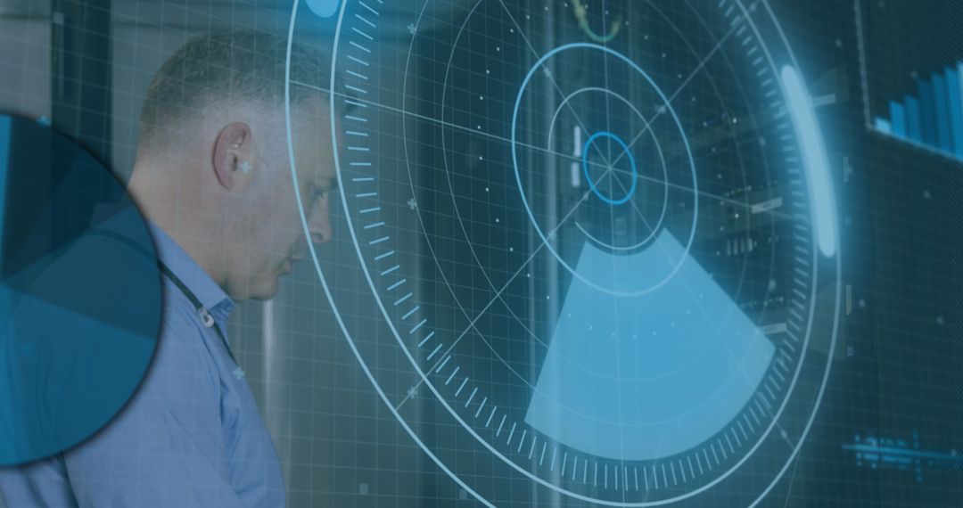 IT Technician Monitoring Digital Data Interface in Server Room