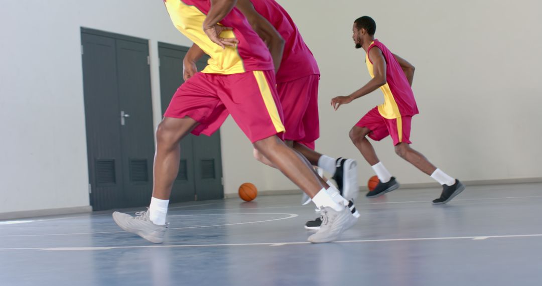 Energetic Basketball Game in Action on Indoor Court