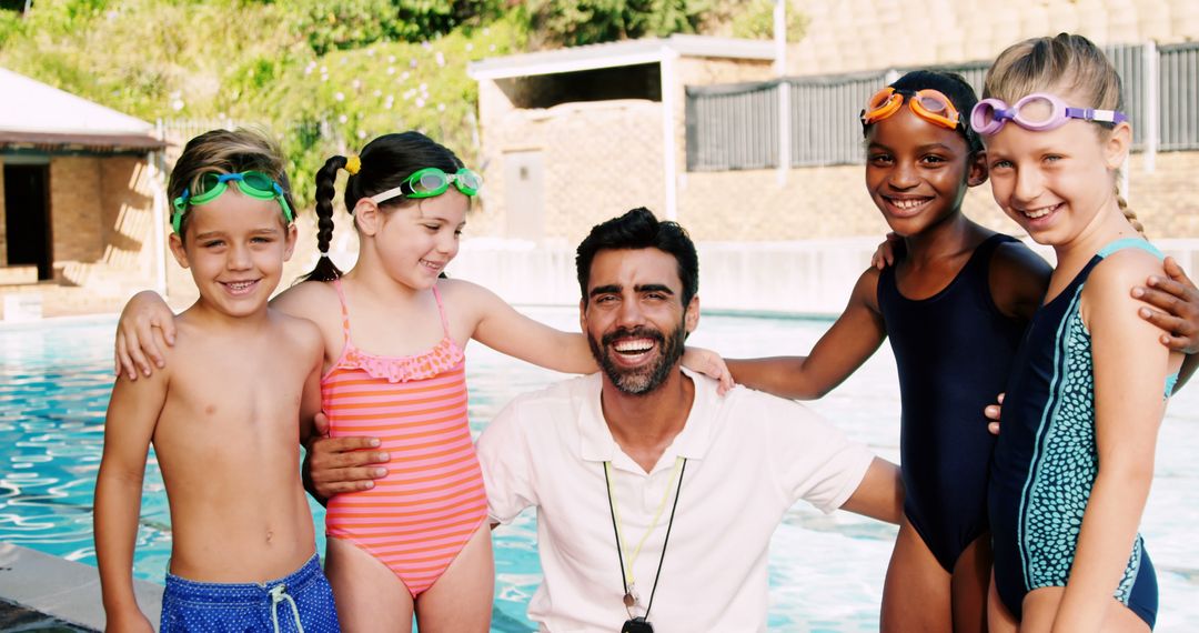 Smiling swimming instructor with happy kids at poolside - Free Images, Stock Photos and Pictures on Pikwizard.com