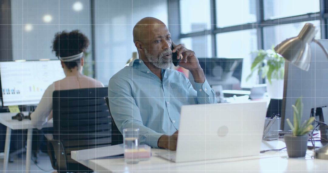 Business Professional Processing Financial Data in Modern Office