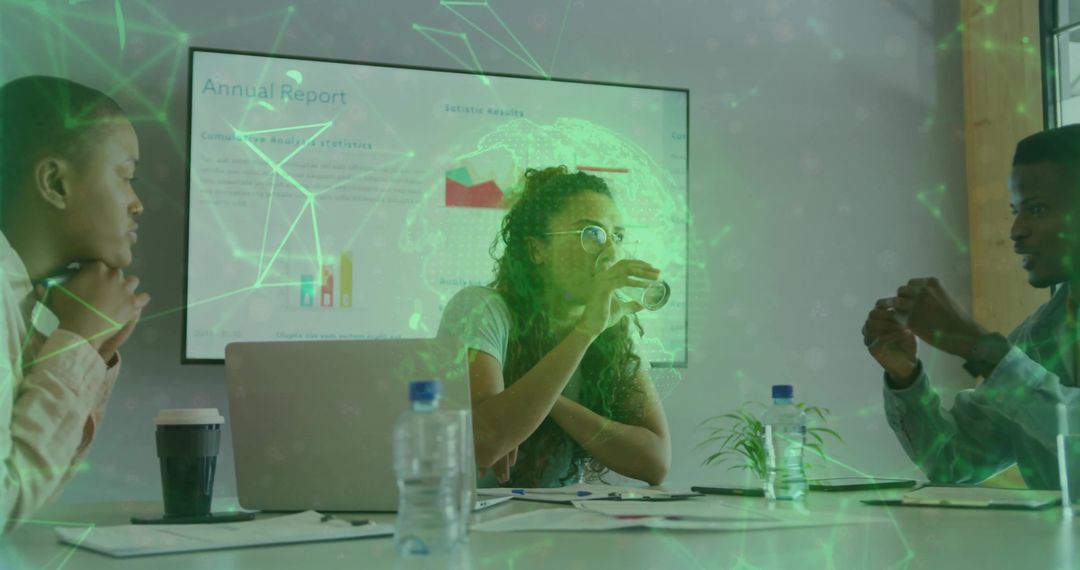 Professionals Collaborating in Modern Meeting with Digital Visualization