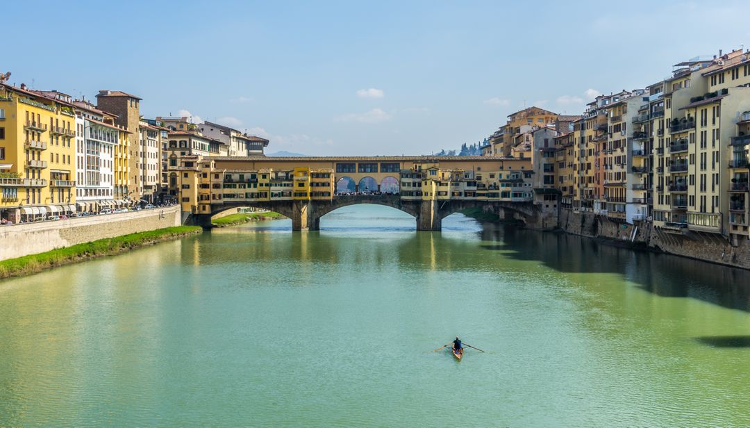 Peaceful Scene of Ponte Vecchio and Arno River in Florence - Free Images, Stock Photos and Pictures on Pikwizard.com