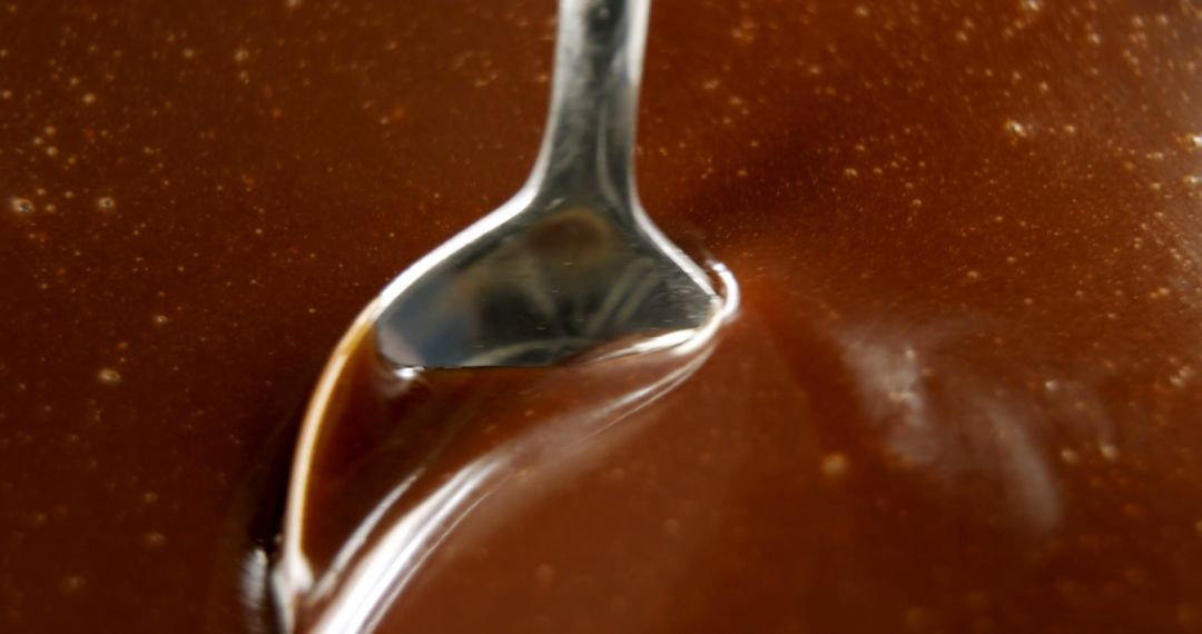 Close-Up of Metal Spoon in Rich Brown Sauce - Free Images, Stock Photos and Pictures on Pikwizard.com