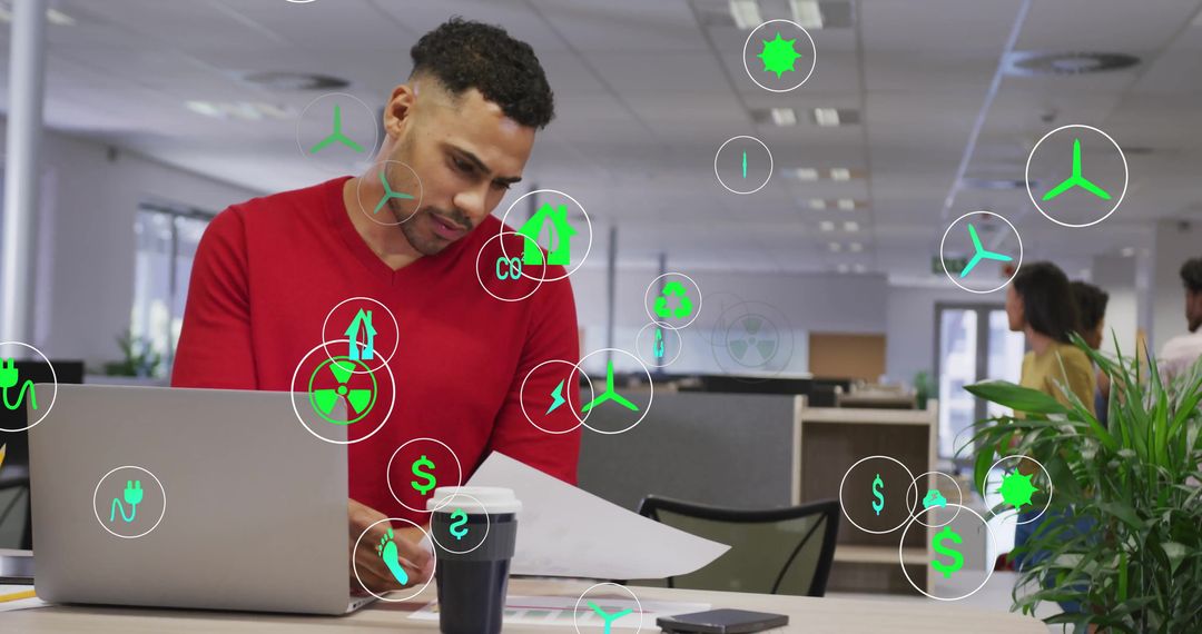 Modern Office Worker Analyzing Data with Floating Digital Icons