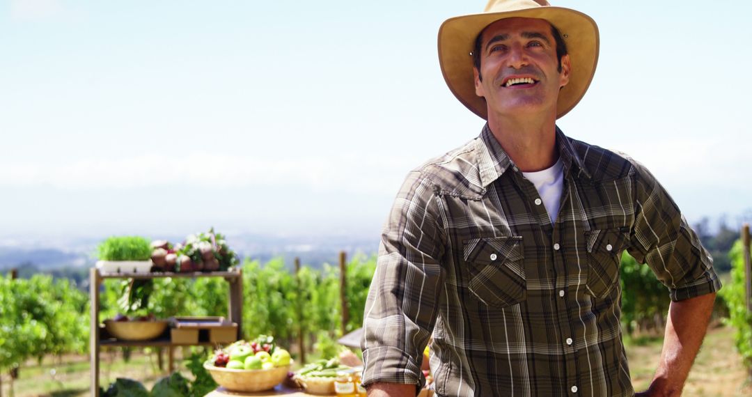 Smiling Farmer in Vegetable Garden with Fresh Harvest - Free Images, Stock Photos and Pictures on Pikwizard.com