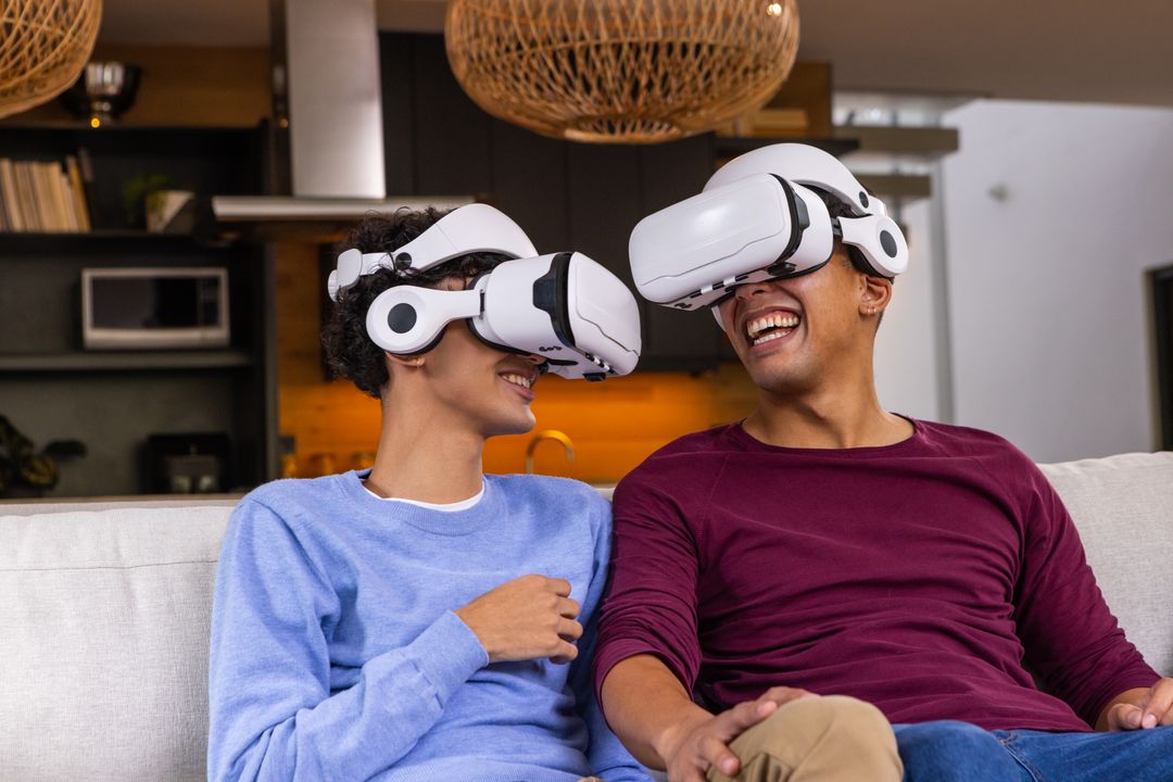 Friends Enjoying Virtual Reality Experience on Couch at Home