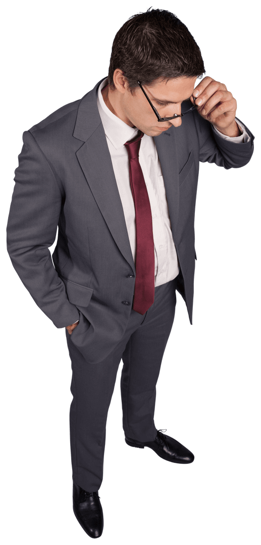Transparent Businessman in Gray Suit Looking Down, Touching Glasses