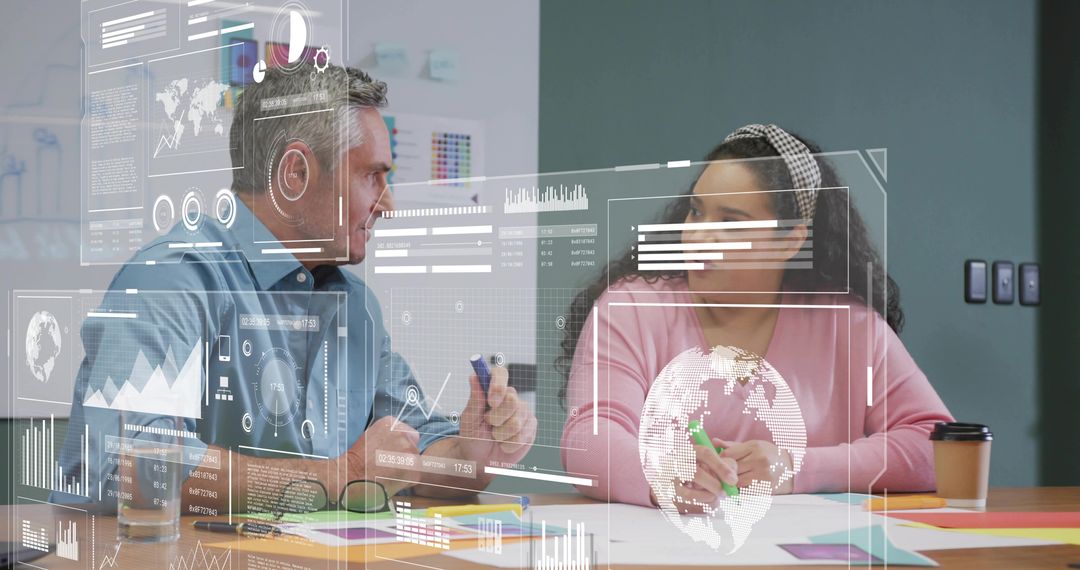 Colleagues Using Augmented Reality Data in Modern Office Meeting