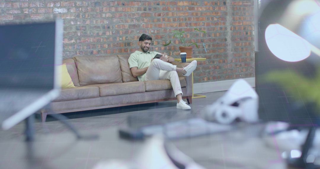 Tech-Savvy Professional Relaxing in Creative Office Lounge