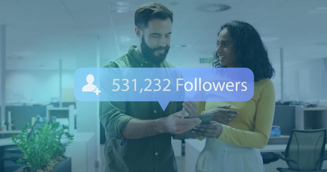 Colleagues Discussing Social Media Metrics in Modern Office