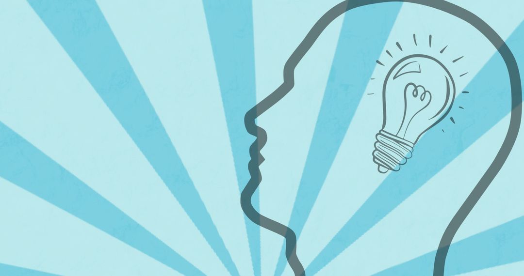 Silhouette of Human Head with Lightbulb Inspiration Concept