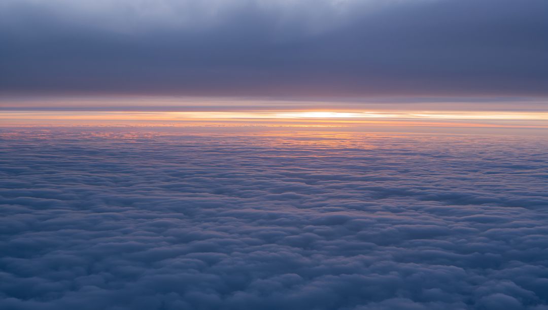 Serene Cloudscape: Stratocumulus Layers at Sunrise