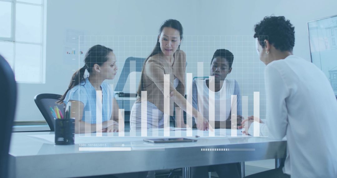 Diverse Business Team Collaborating with Analytics Graphic Overlay