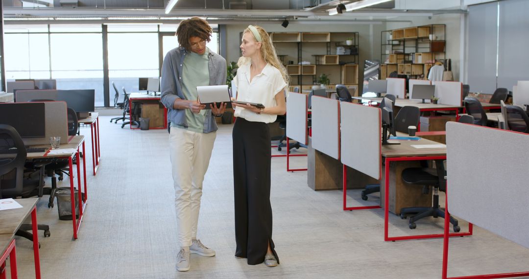 Collaborating Colleagues with Tablet in Modern Open Office