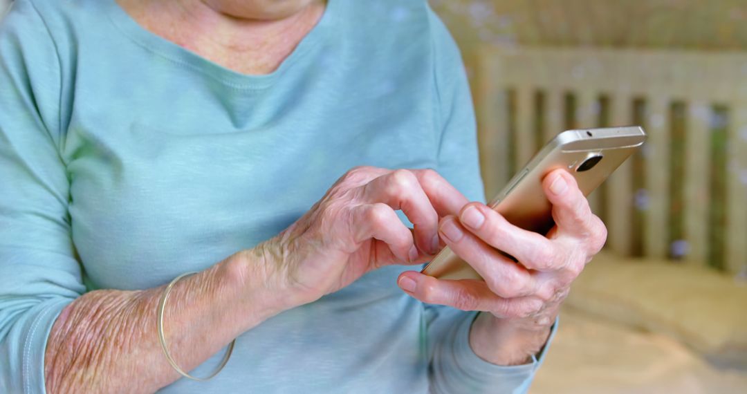 Senior Woman Using Smartphone at Home - Free Images, Stock Photos and Pictures on Pikwizard.com