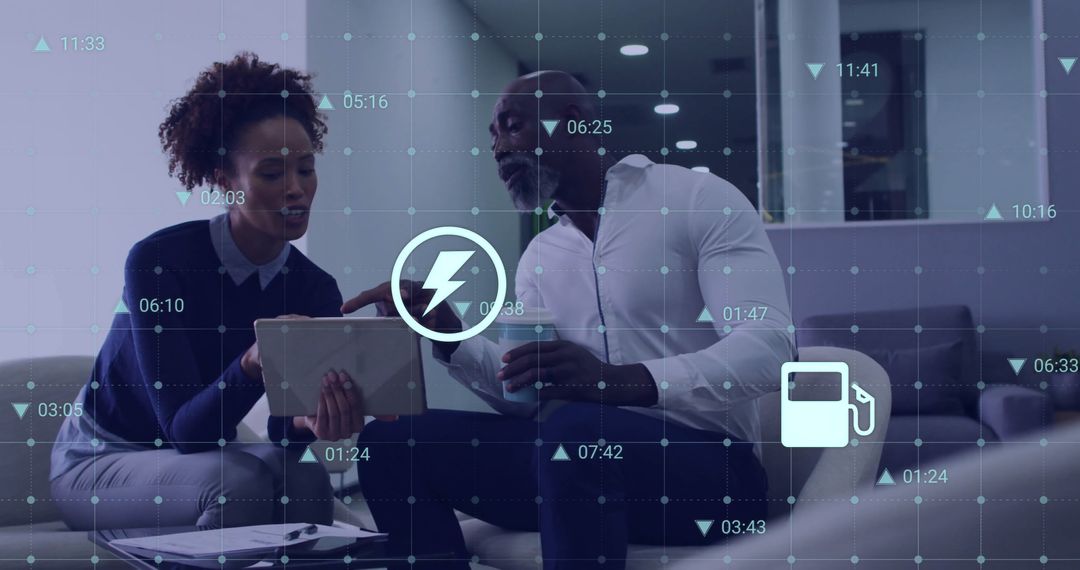 Diverse Colleagues Discussing Digital Financial Data in Modern Office