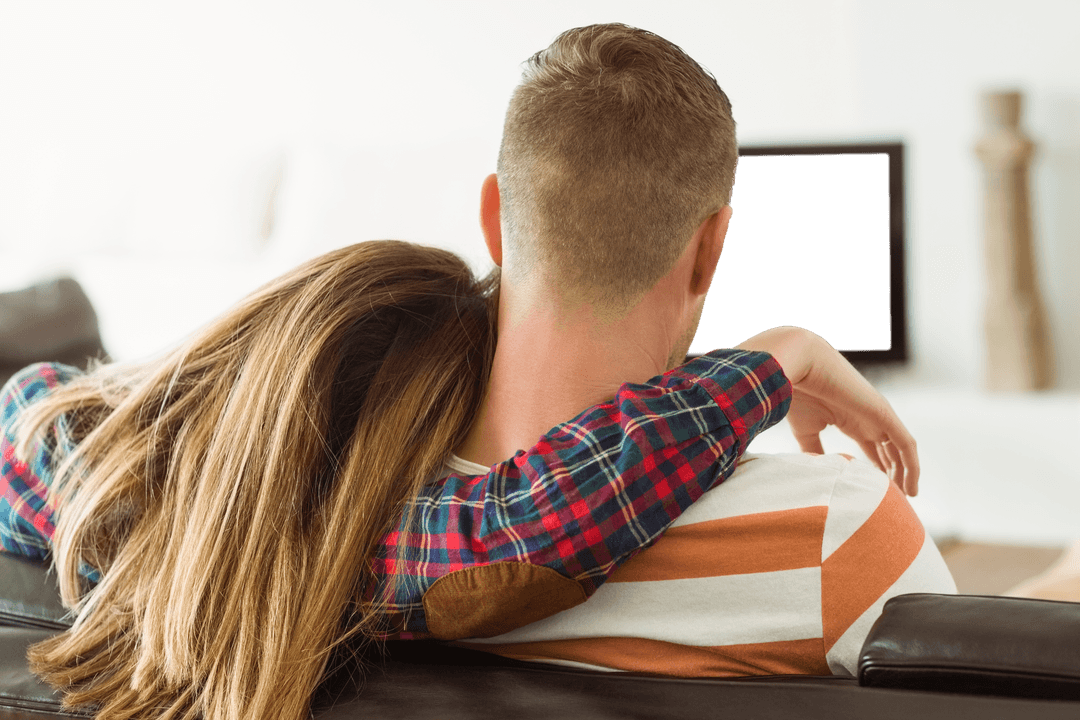 Transparent View of Couple Relaxing on Cozy Home Couch