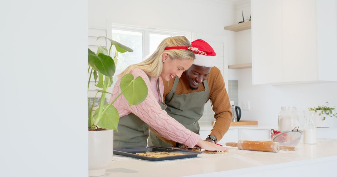 Festive Couple Baking Holiday Cookies Together at Home