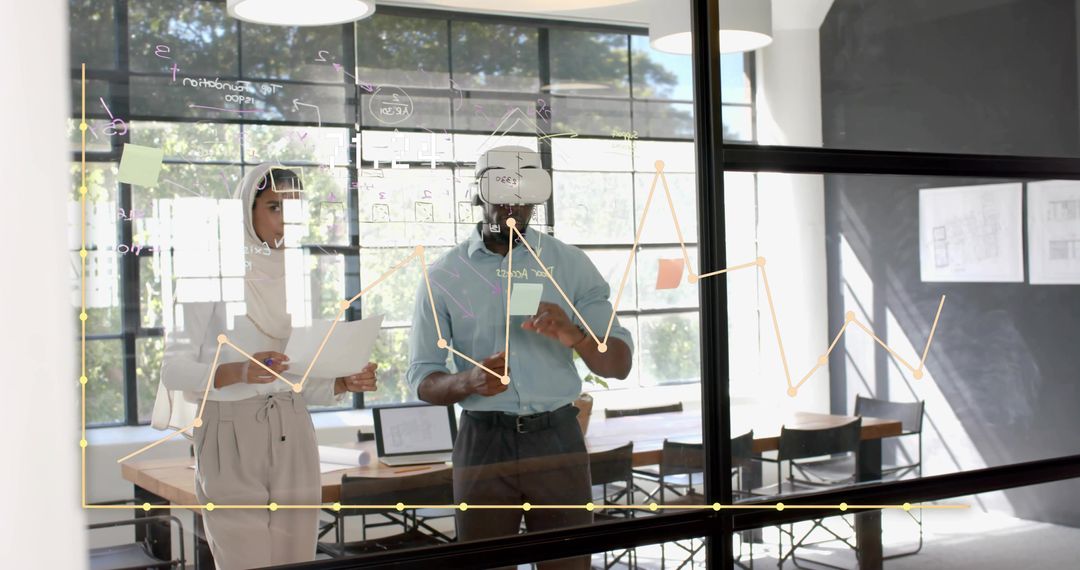 Team Brainstorming with Technology and VR in Modern Office Setting