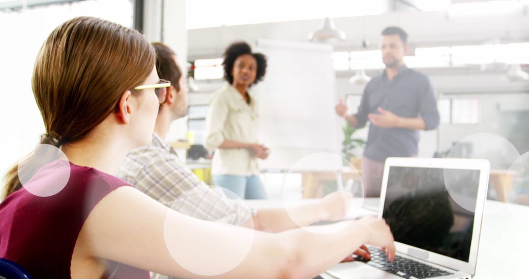 Inclusive Business Meeting With Diverse Team Members Engaged in Discussion