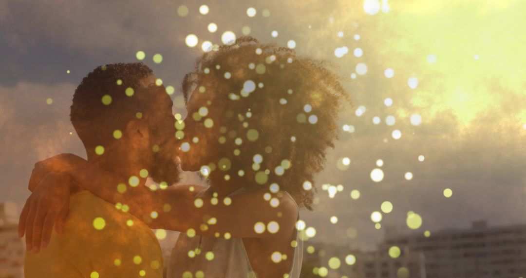 Romantic Couple Embracing on Scenic Rooftop at Sunset with Golden Bokeh