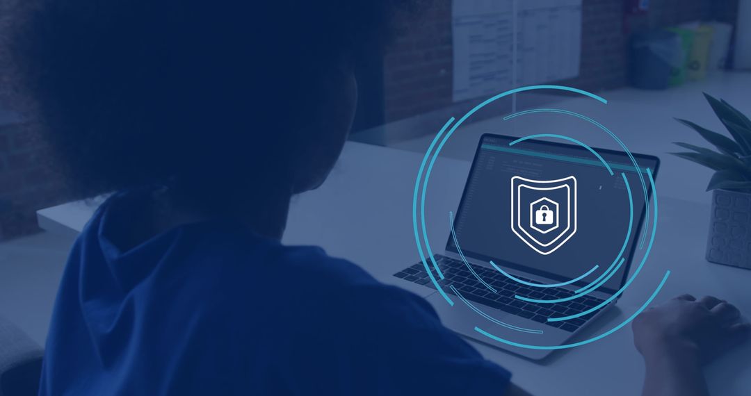 Cybersecurity Concept with Businesswoman Using Laptop in Office