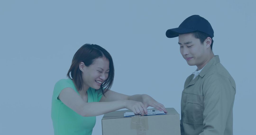 Courier Hands Package to Smiling Recipient in Studio