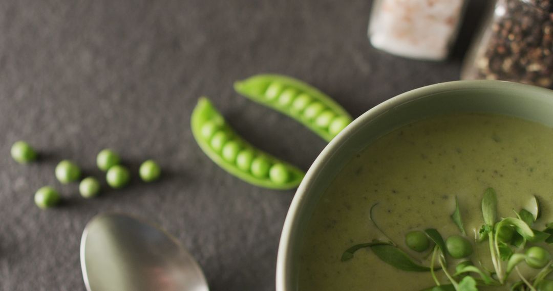 Close-Up of Fresh Green Pea Soup with Ingredients