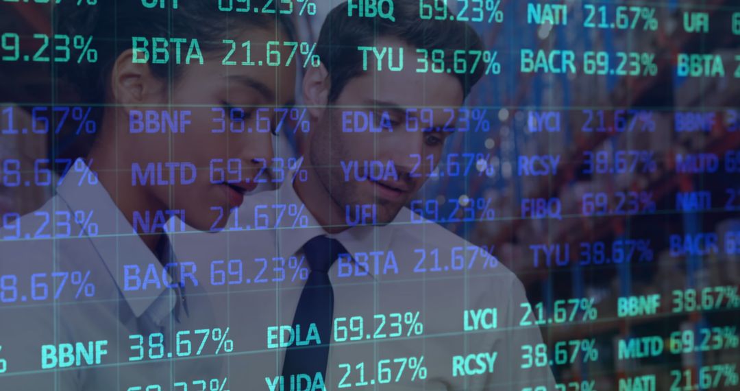 Diverse Business Professionals Analyzing Stock Market on Warehouse Floor