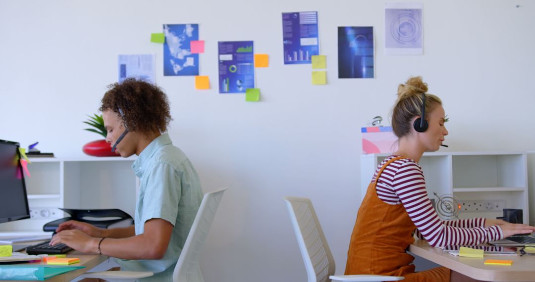 Focused Colleagues Working in Customer Service Environment