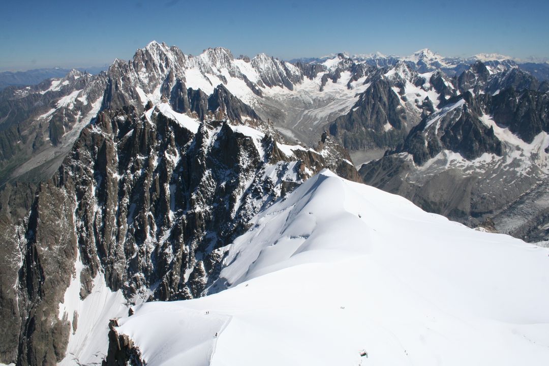 Panoramic View of Majestic Snow-Covered Mountain Range - Free Images, Stock Photos and Pictures on Pikwizard.com