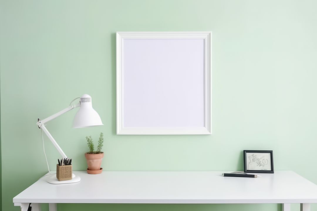 Minimalistic Home Office Desk with Blank Frame - Free Images, Stock Photos and Pictures on Pikwizard.com