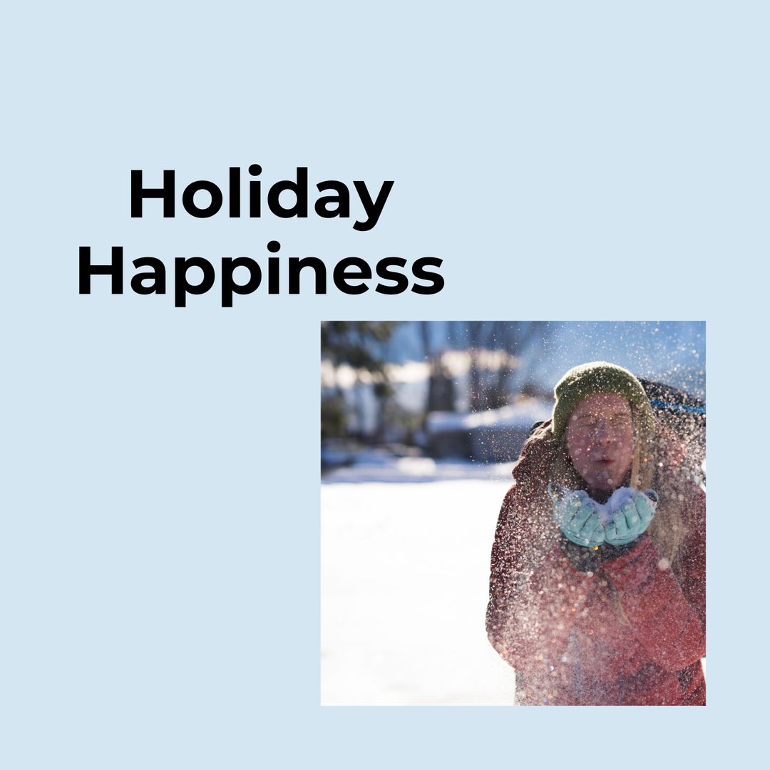 Man Blowing Snow Celebrates Joyful Winter Holiday Scene