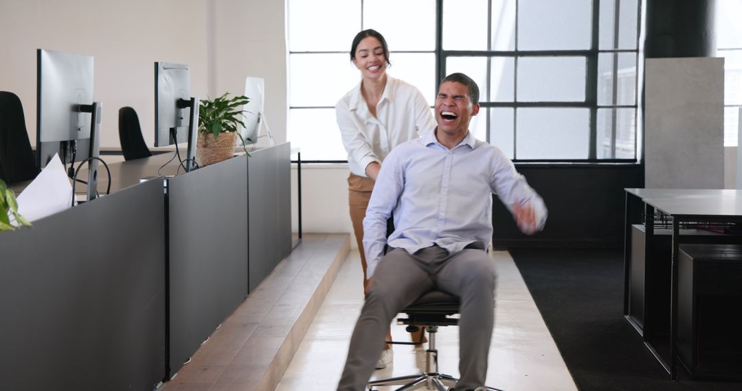 Energetic Colleagues Enjoying Office Break Together