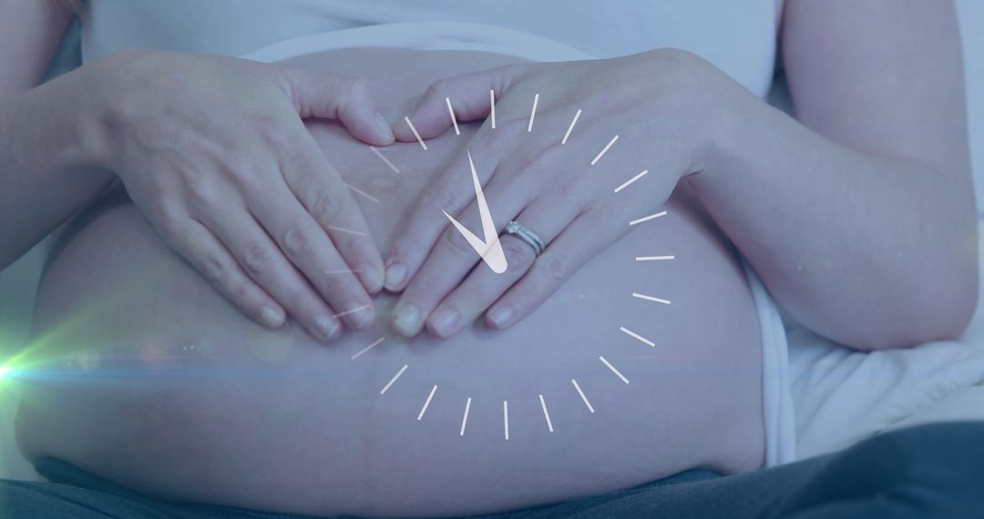 Clock Overlay on Expecting Mother with Heart Gesture on Belly - Free Images, Stock Photos and Pictures on Pikwizard.com